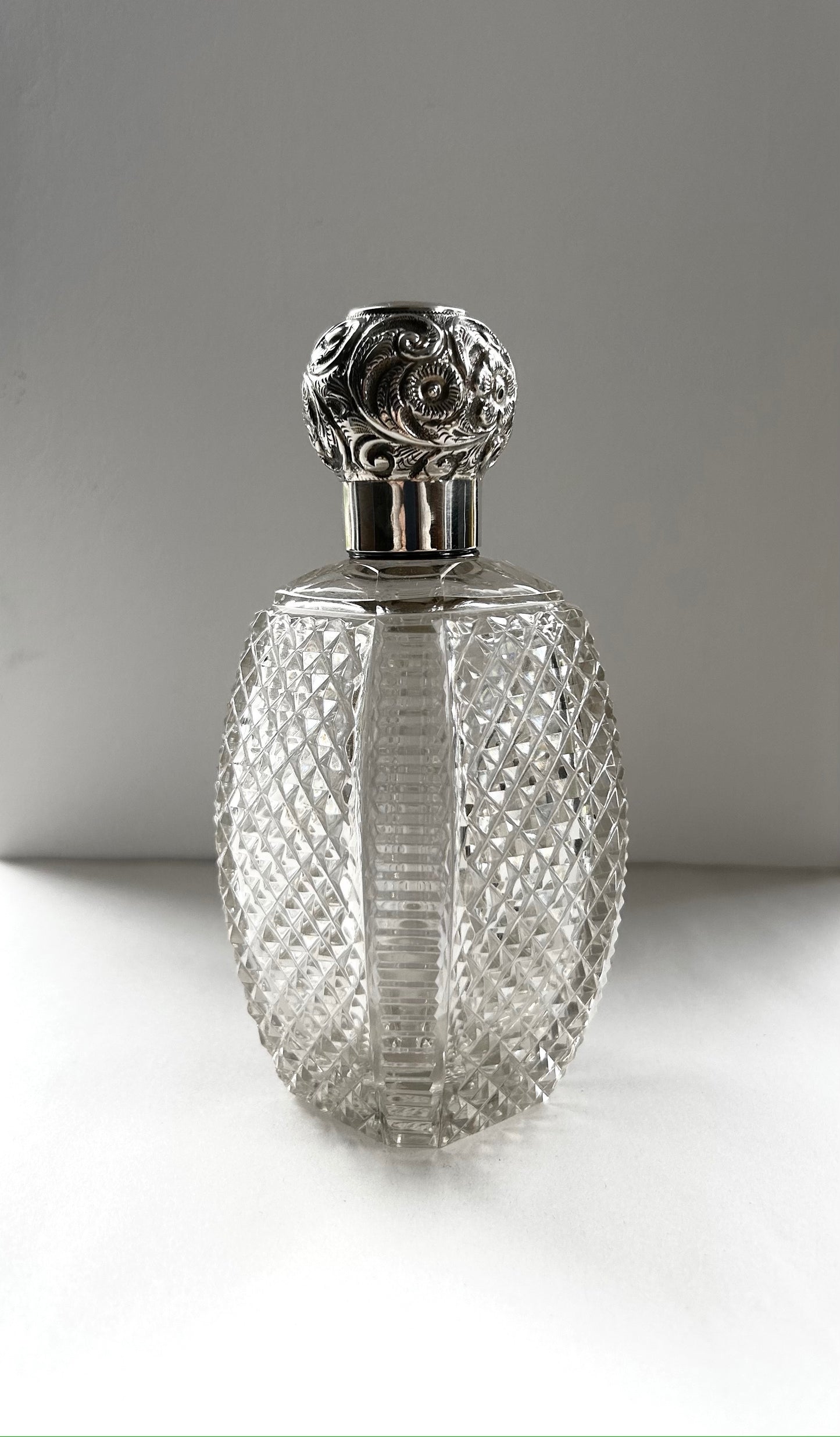 Large Victorian Silver top cut glass scent bottle with engraved initial "D"